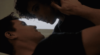 Two Men Close Up One Touching Other's Face