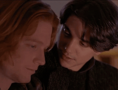 Two Men Close Up One With Red Hair
