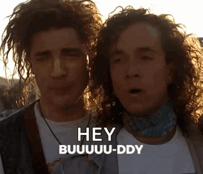 Two Men Curly Hair Saying Hey Buuuddy GIF