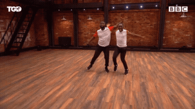 Two Men Dancing In Dance Studio With BBC Logo GIF