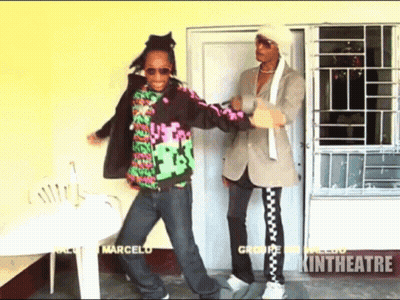 Two Men Dancing In Front Of Door Kintheatre GIF