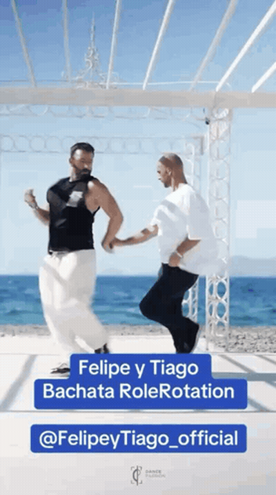 Two Men Dancing In Front Of Gazebo Felipe Y Tiago Bachata Rolerotation GIF