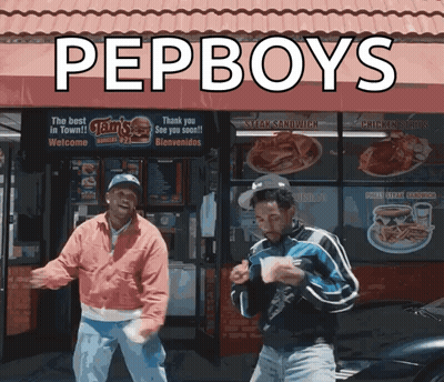 Two Men Dancing In Front Of Pep Boys GIF