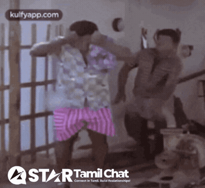 Two Men Dancing In Front Of Star Tamil Chat Logo GIF