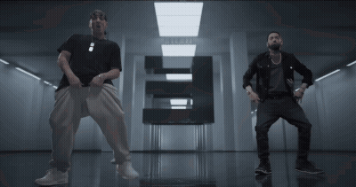 Two Men Dancing In Hallway With Letter E GIF