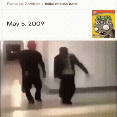 Two Men Dancing Near Plants Vs Zombies Poster GIF