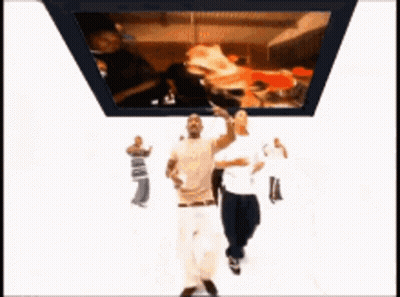 Two Men Dancing Near TV With Pizza GIF