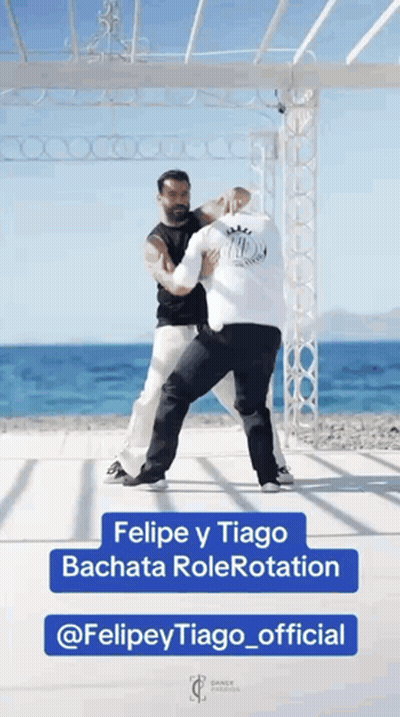 Two Men Dancing Ocean Felipe Y Tiago Bachata Rolerotation GIF