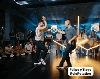 Two Men Dancing On Stage Felipe Y Tiago Rolerotation GIF