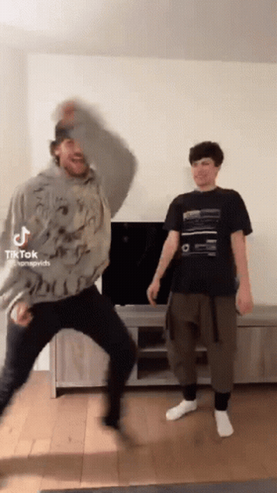 Two Men Dancing Together GIF