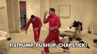 Two Men Dancing With Fistpump Pushup Chapstick GIF
