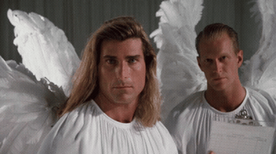 Two Men Dressed As Angels Are Standing Next To Each Other And One Is Holding A Clipboard GIF