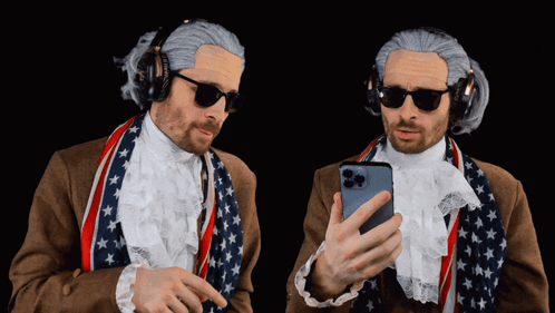 Two Men Dressed As George Washington Looking At Phones GIF