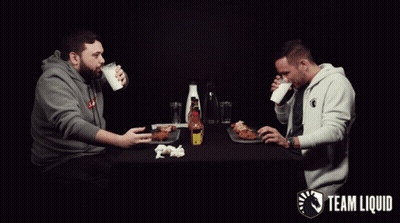 Two Men Drinking Milk And Eating Fried Chicken GIF