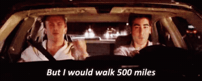 Two Men Driving Car At Night One Talking GIF