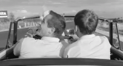 Two Men Driving Car On Highway GIF