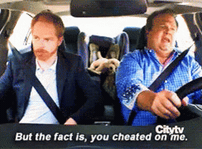 Two Men Driving Car With Dog Saying But The Fact Is You Cheated On Me GIF