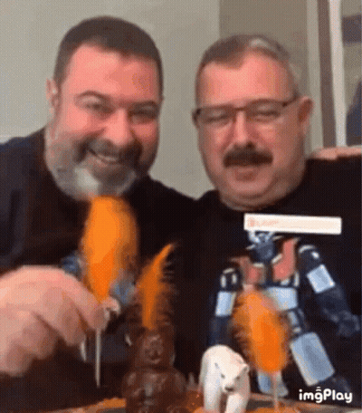 Two Men Eating Carrots With Polar Bear GIF