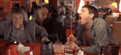 Two Men Eating Food With Ketchup GIF