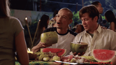 Two Men Eating Watermelon And Drinking Coconuts Almost Paradise GIF