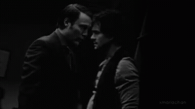 Two Men Face To Face Black And White GIF