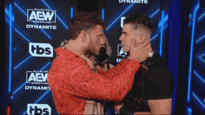 Two Men Facing Each Other AEW Dynamite Sign GIF