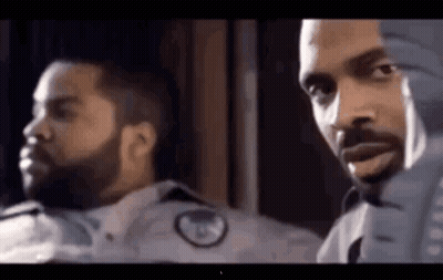 Two Men Facing Each Other One With Beard GIF