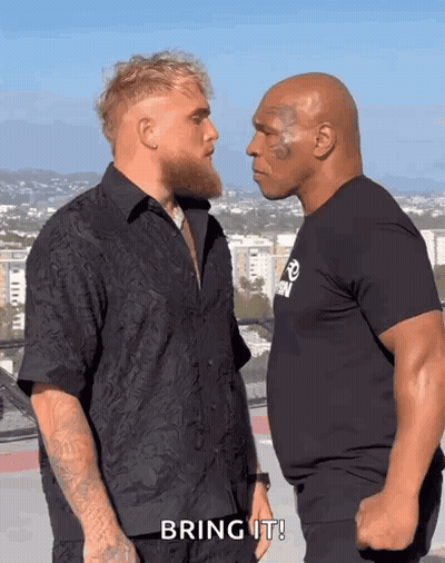 Two Men Facing Off Saying Bring It GIF