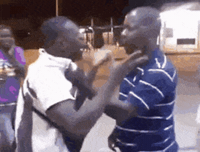 Two Men Fighting GIF