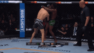 Two Men Fighting Boxing Ring Bud Light Ad GIF