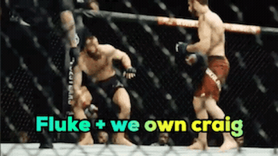 Two Men Fighting In A Cage With The Words Fluke + We Own Craig GIF