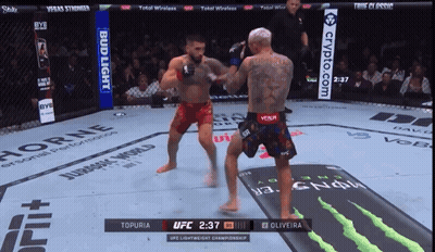 Two Men Fighting In Boxing Ring GIF