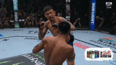 Two Men Fighting In Boxing Ring GIF