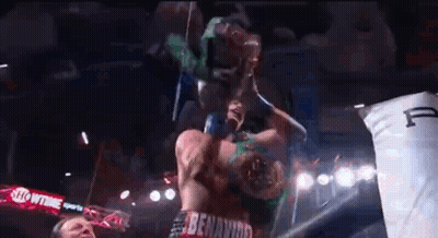 Two Men Fighting In Boxing Ring GIF