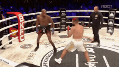 Two Men Fighting In Boxing Ring GIF