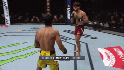 Two Men Fighting In Boxing Ring At 0:49 GIF