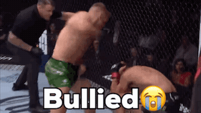 Two Men Fighting In Boxing Ring Bullied GIF