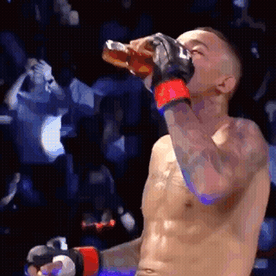 Two Men Fighting In Boxing Ring GIF