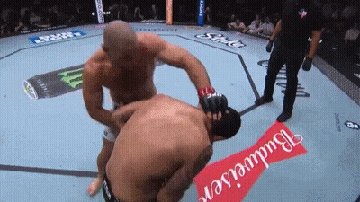 Two Men Fighting In Boxing Ring GIF