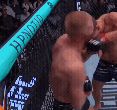 Two Men Fighting In Boxing Ring Hypnotic Sign GIF