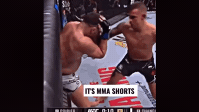 Two Men Fighting In Boxing Ring It's MMA Shorts GIF
