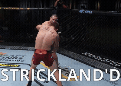 Two Men Fighting In Boxing Ring GIF