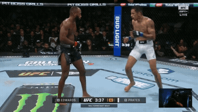 Two Men Fighting In Boxing Ring GIF