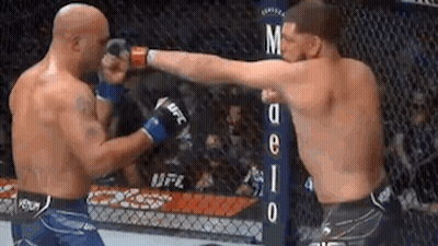 Two Men Fighting In Boxing Ring GIF