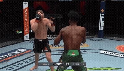 Two Men Fighting In Boxing Ring One In Reebok Shorts GIF