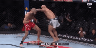 Two Men Fighting In Boxing Ring GIF