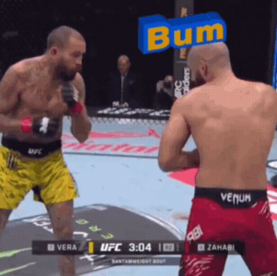 Two Men Fighting In Boxing Ring Saying Bum GIF