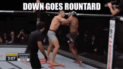 Two Men Fighting In Boxing Ring Saying Down Goes Roundard GIF