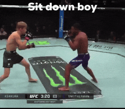 Two Men Fighting In Boxing Ring Sit Down Boy GIF