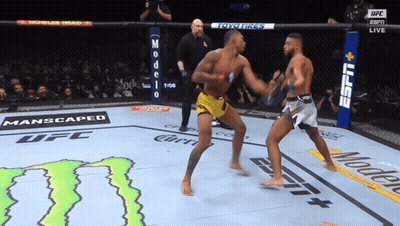 Two Men Fighting In Boxing Ring Sponsored By ESPN And Monster GIF